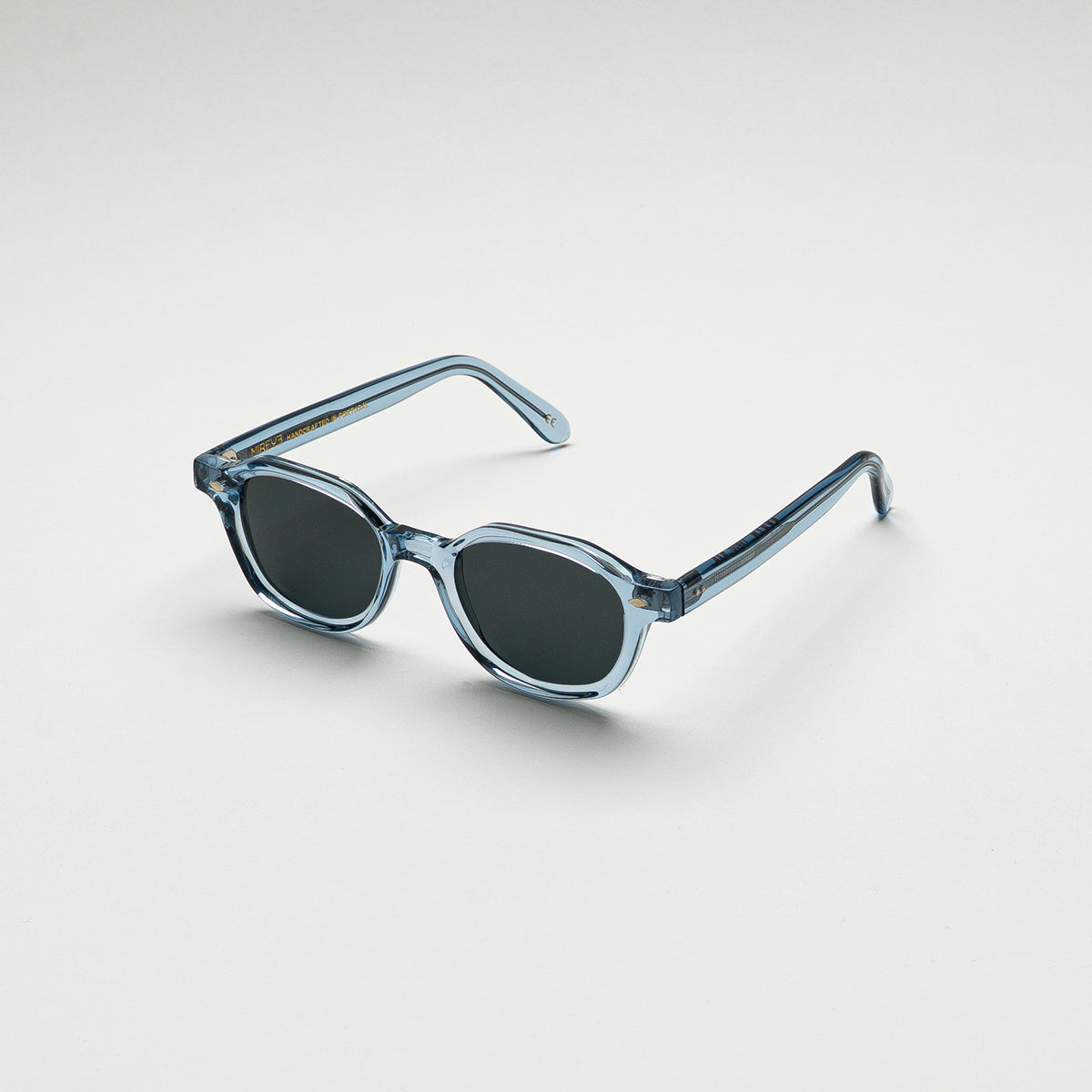 Mireye Earth sunglasses in crystal blue, perspective view.