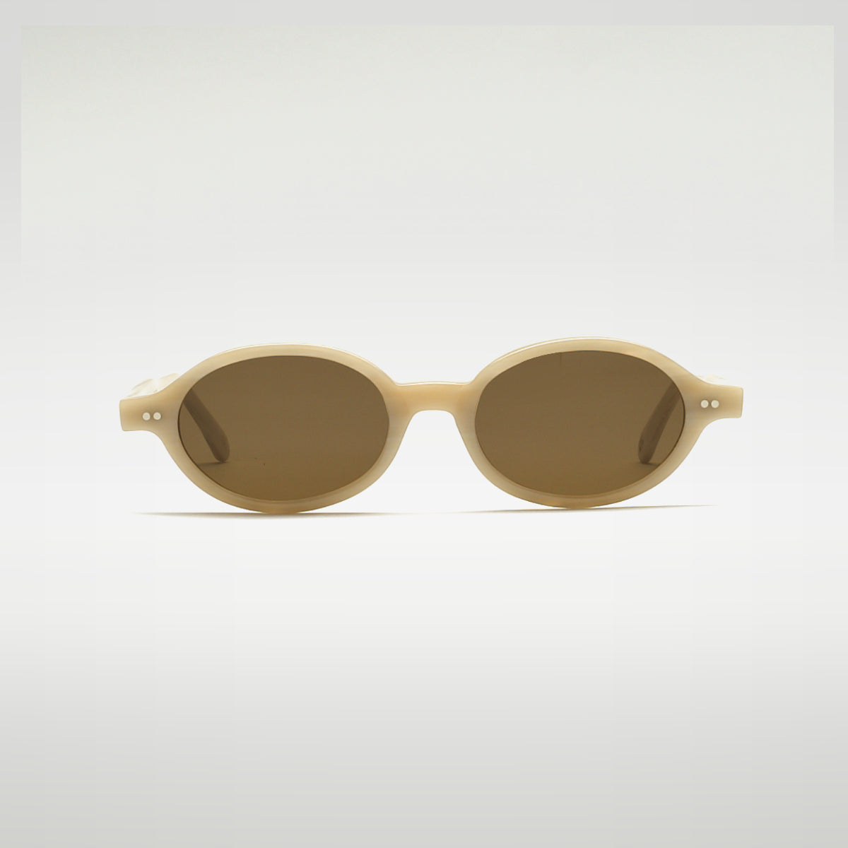 Mireye Kirra sunglasses in white pearl, front view.