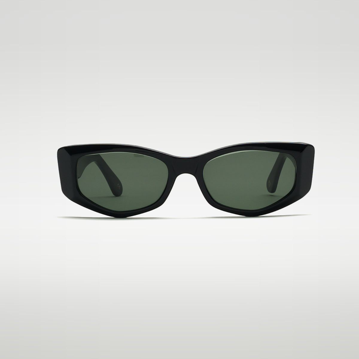 Mireye Mundaka sunglasses in black with green lenses, front view.