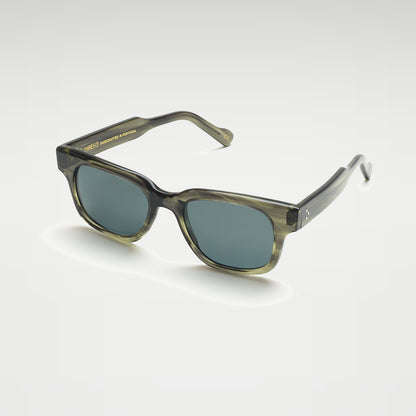 Mireye Roti sunglasses in deep forest, perspective view.