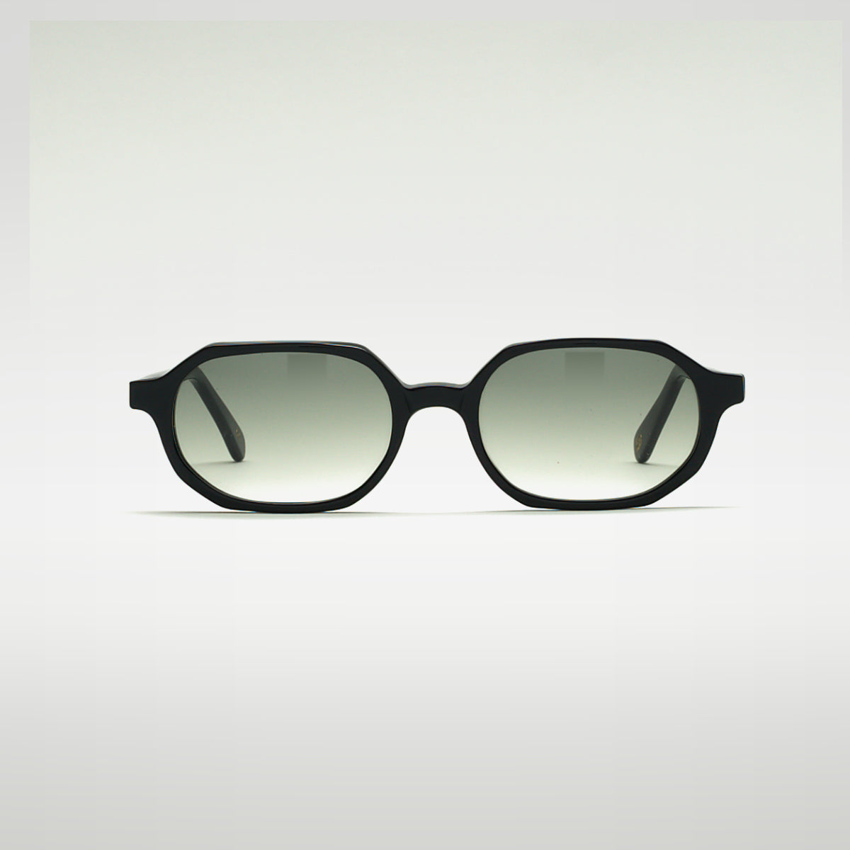 Mireye Zicattela sunglasses in black with gradient green lenses, front view.