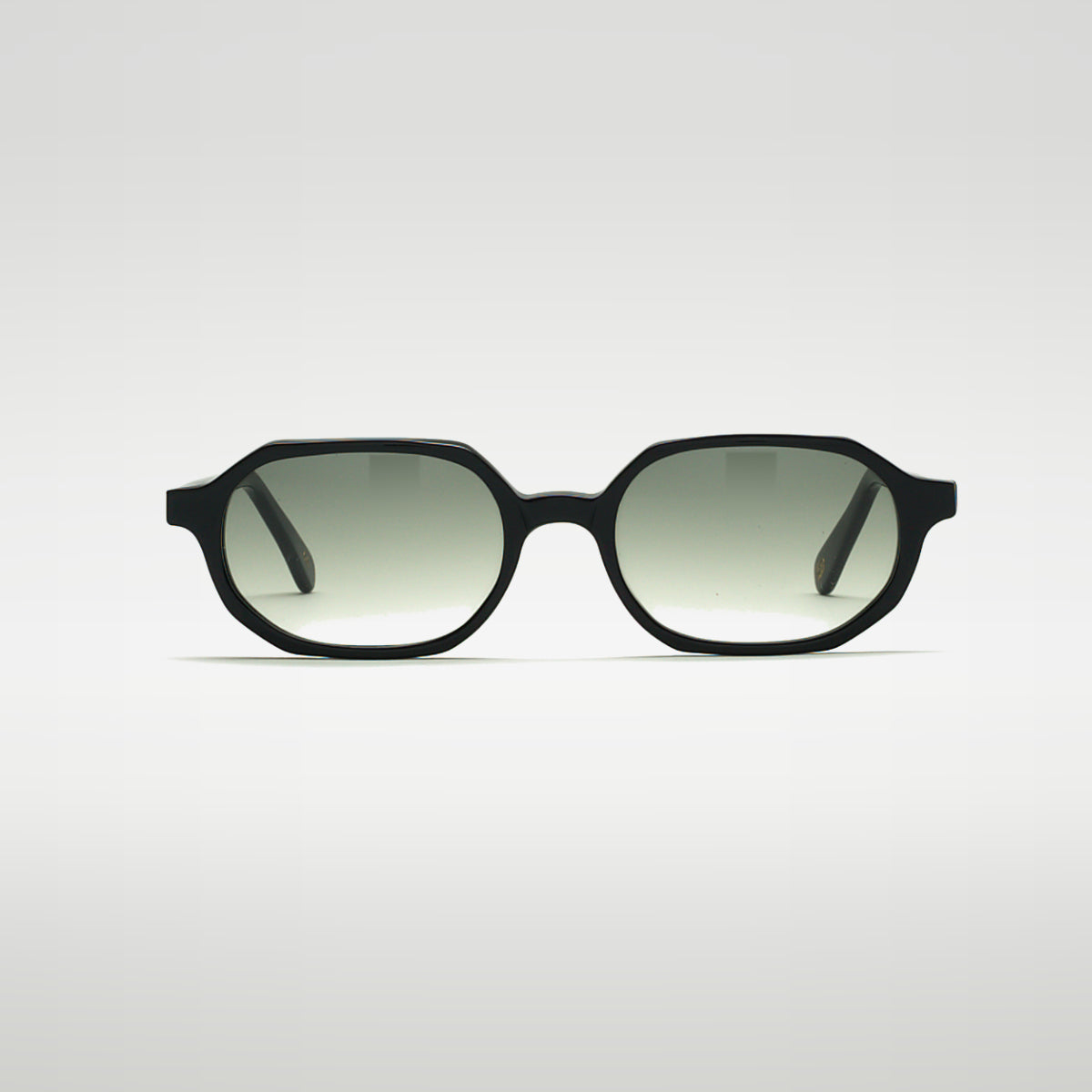 Mireye Zicattela sunglasses in black with gradient green lenses, front view.