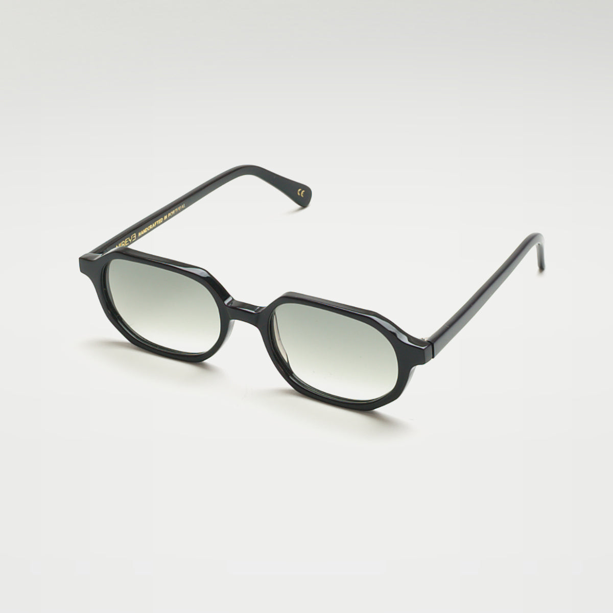 Mireye Zicattela sunglasses in black with gradient green lenses, perspective view.